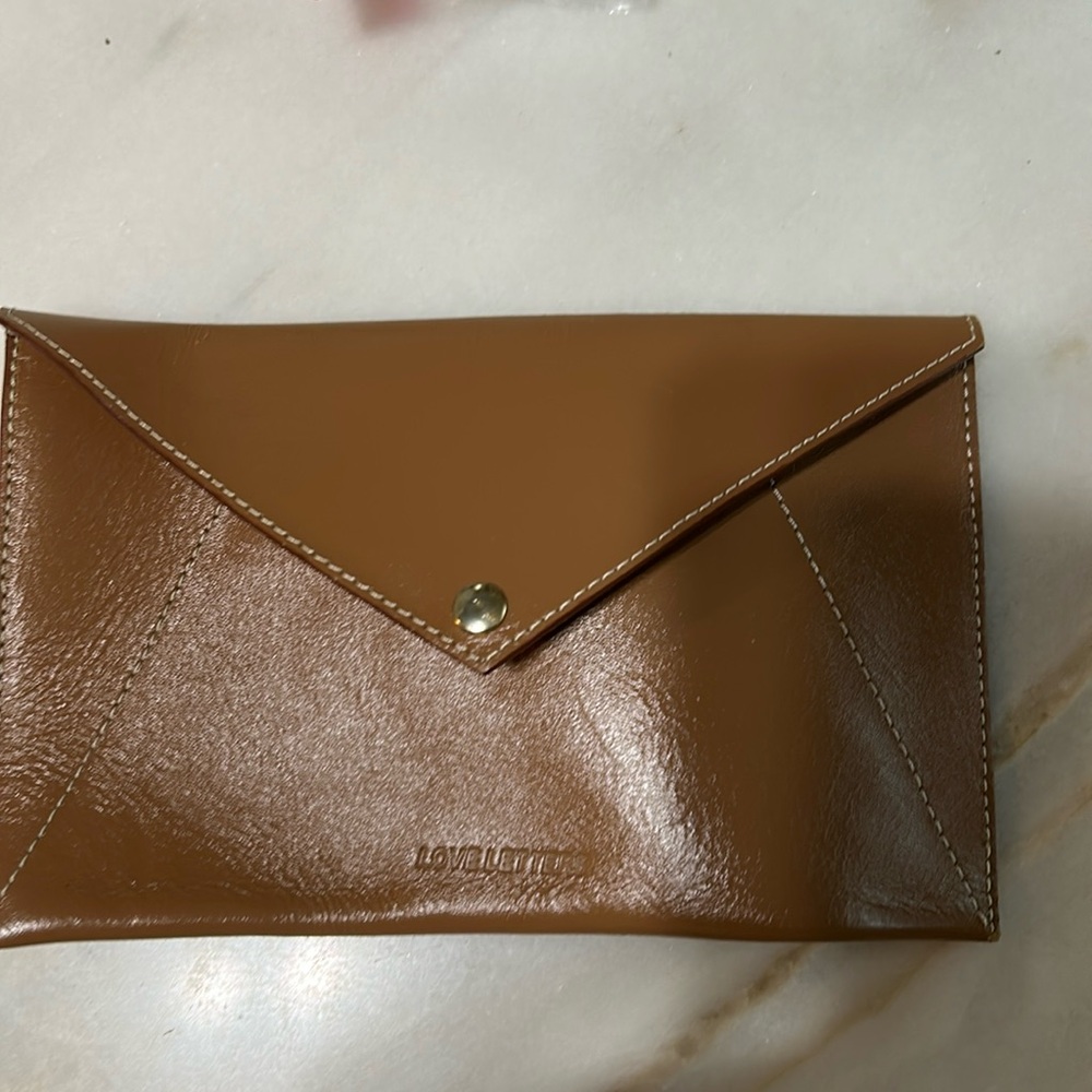 Faun leather wallet case very nice brought in Barney’s of NY